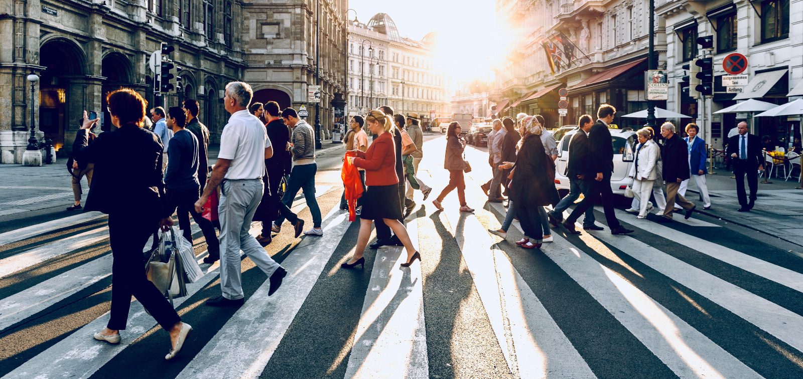 People crossing a pedestrian crossing