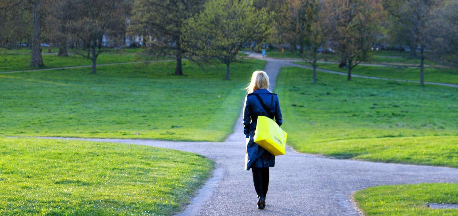 Blonde woman in a green space