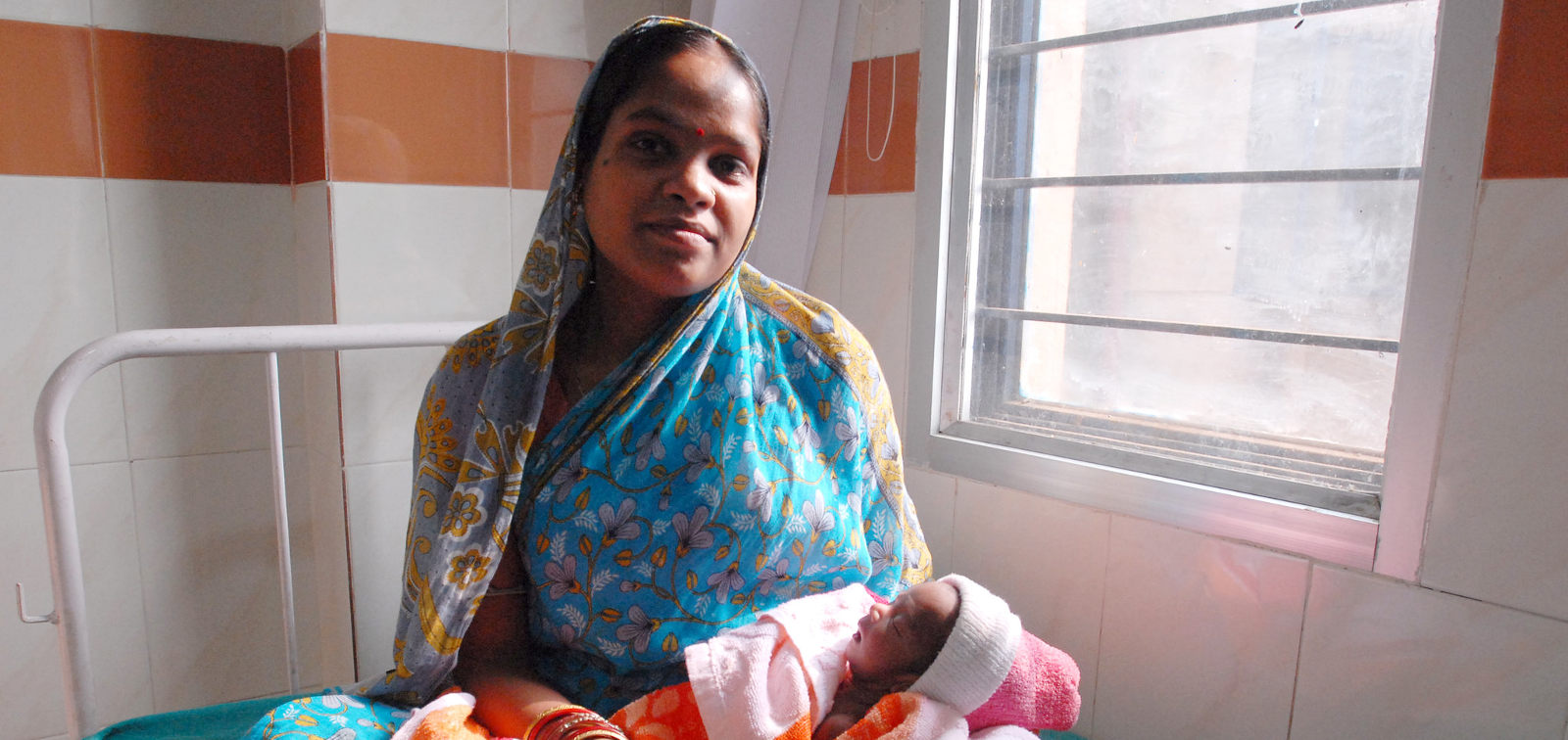 Indian woman with her baby