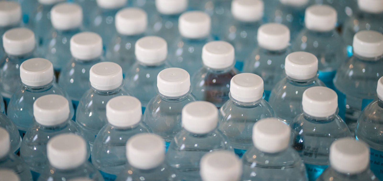 Bottled water. Photo by Jonathan Chng on Unsplash.